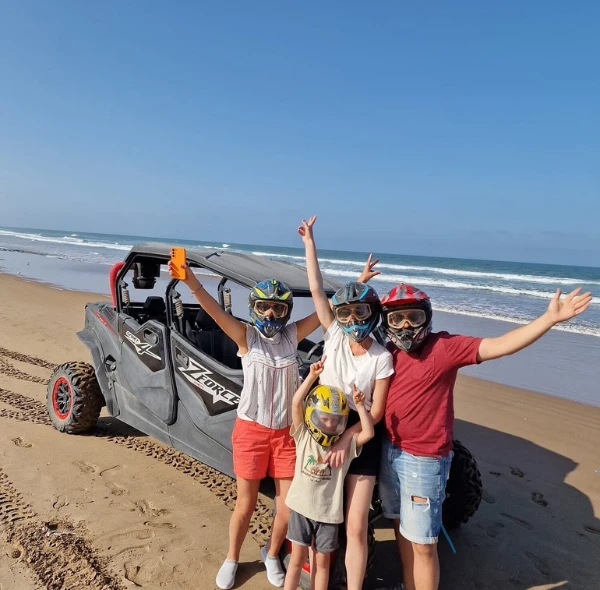 Buggy family ride on the beach