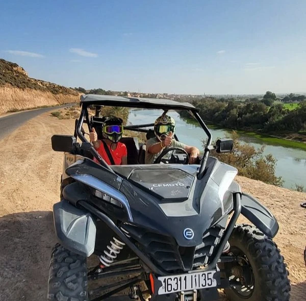 Buggy riding through natural terrain