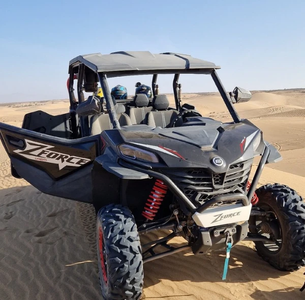 Buggy in desert landscape