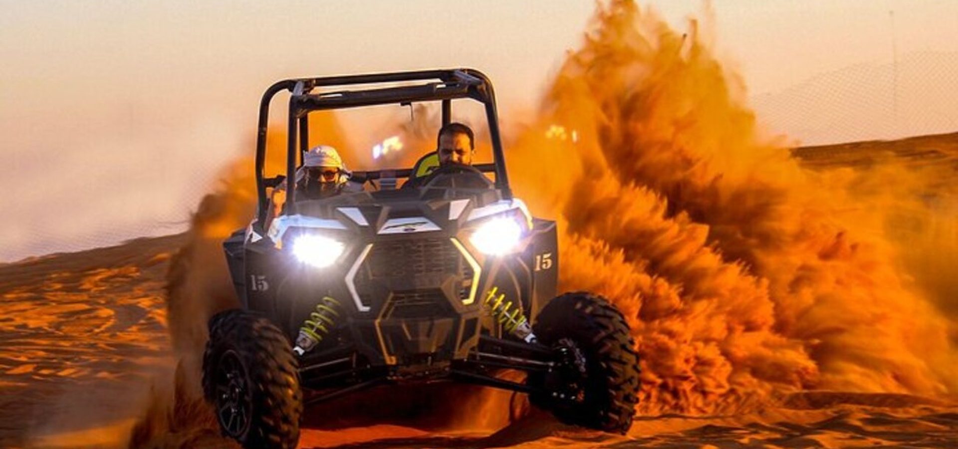 Quad biking in the desert at sunset near Agadir